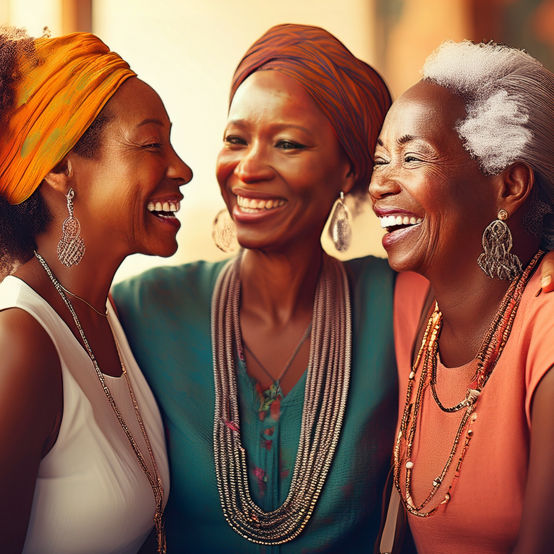 A small group of women laughing and supporting each other, symbolizing finding your people.